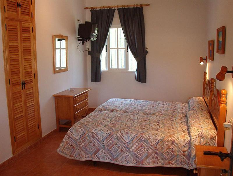 Hostal Las Acacias Los Caños de Meca Habitación foto